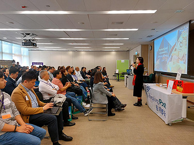 A representative of Hongkong Post introduces its local and non-local delivery services A representative of Hongkong Post introduces its local and non-local delivery services